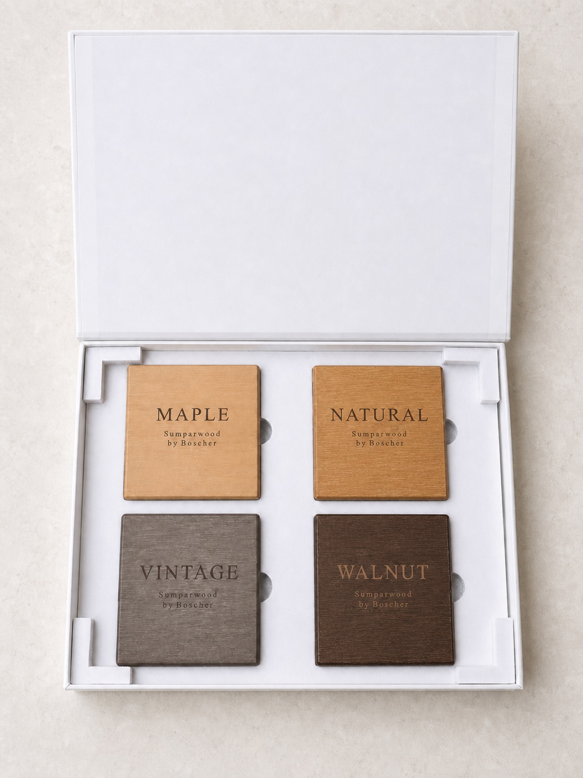 Open Sumparwood Sample Box showing Vintage, Natural, Maple and Walnut finish samples.
