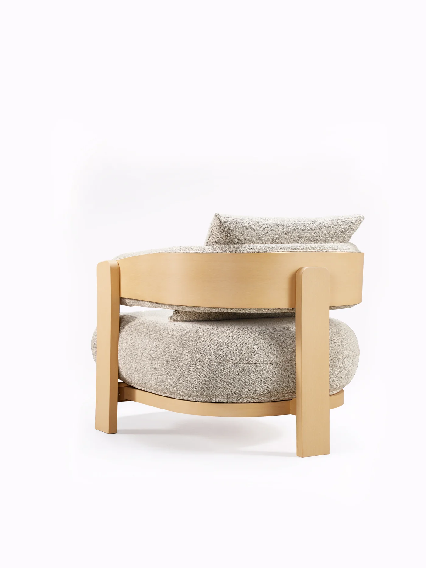 Rear view of the Sumparwood lounge chair with integrated upholstery