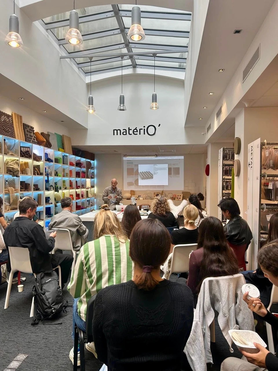 Members seated in the matériO Paris showroom during the broader new-materials presentation