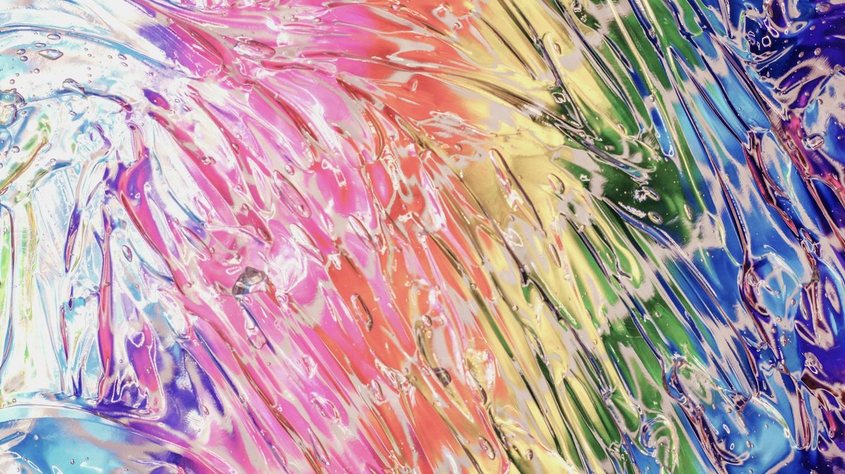 Abstract bands of colour forming a textured visual field.