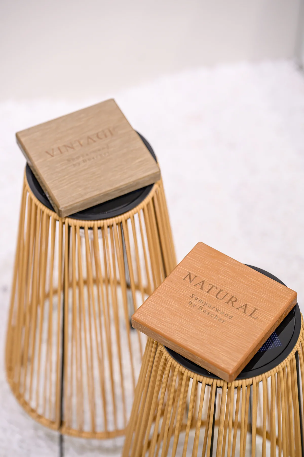 Two rounded open-frame side tables seen from above