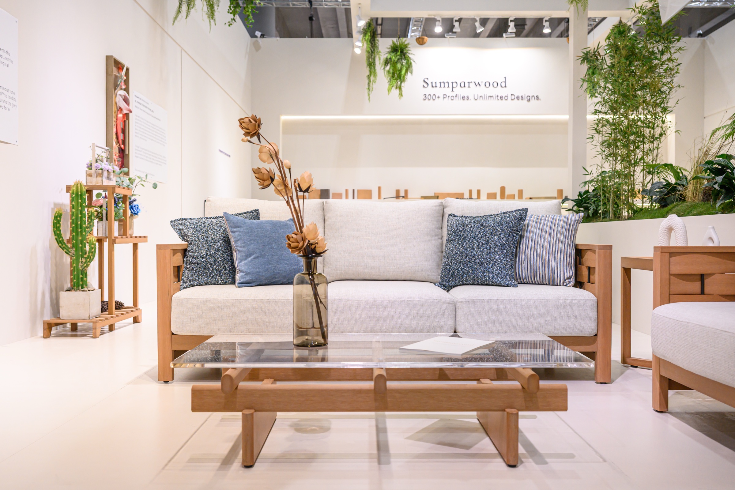 Sumparwood material and outdoor furniture presented in an exhibition setting