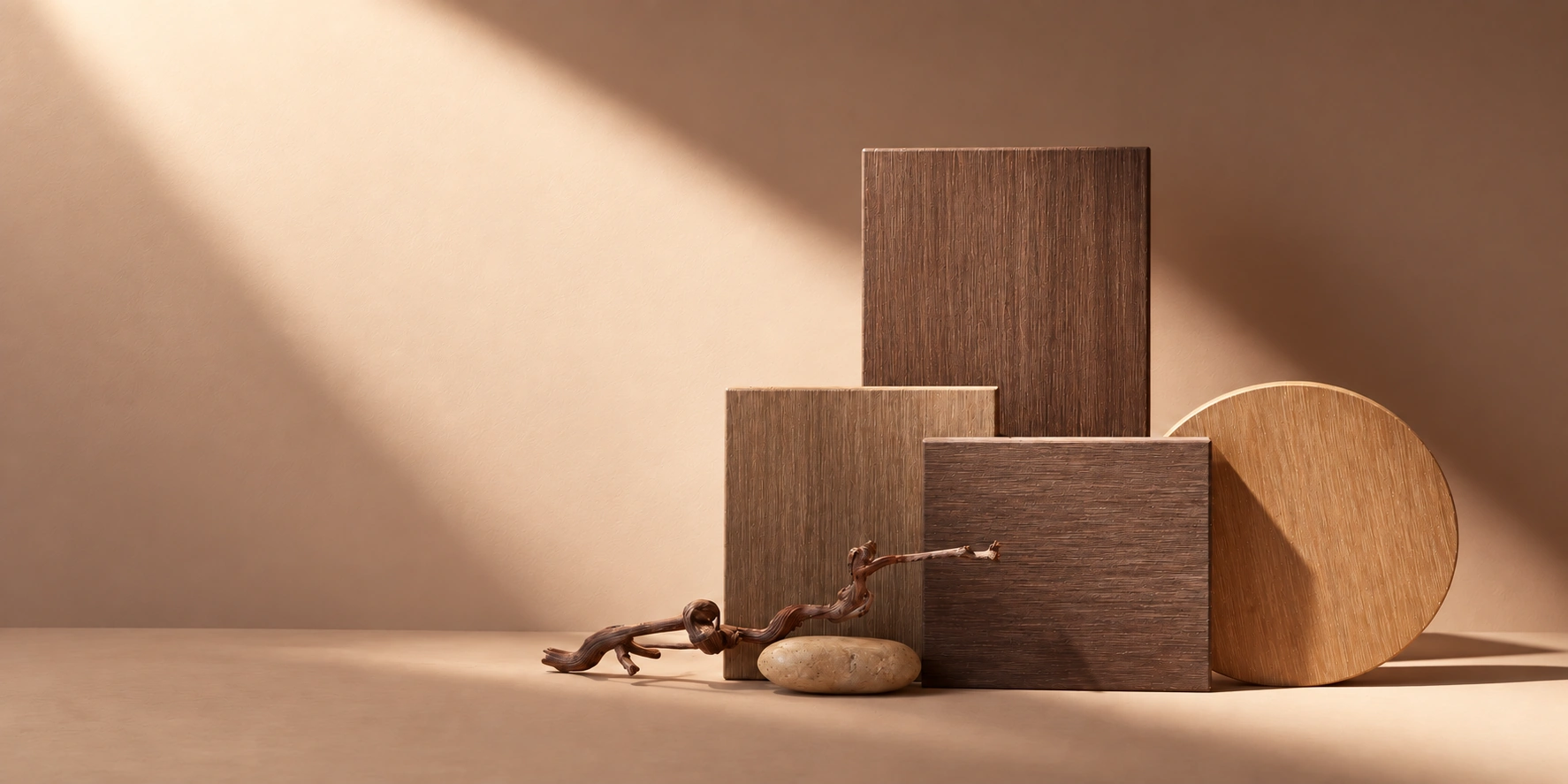 Art-directed composition of wood-like material boards in warm brown and honey tones under diagonal sunlight