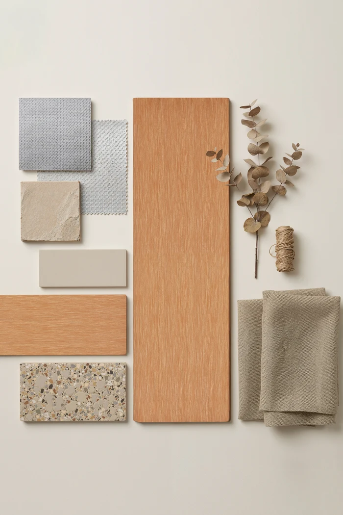 Natural Sumparwood pairing board with neutral textiles, warm stone and terrazzo