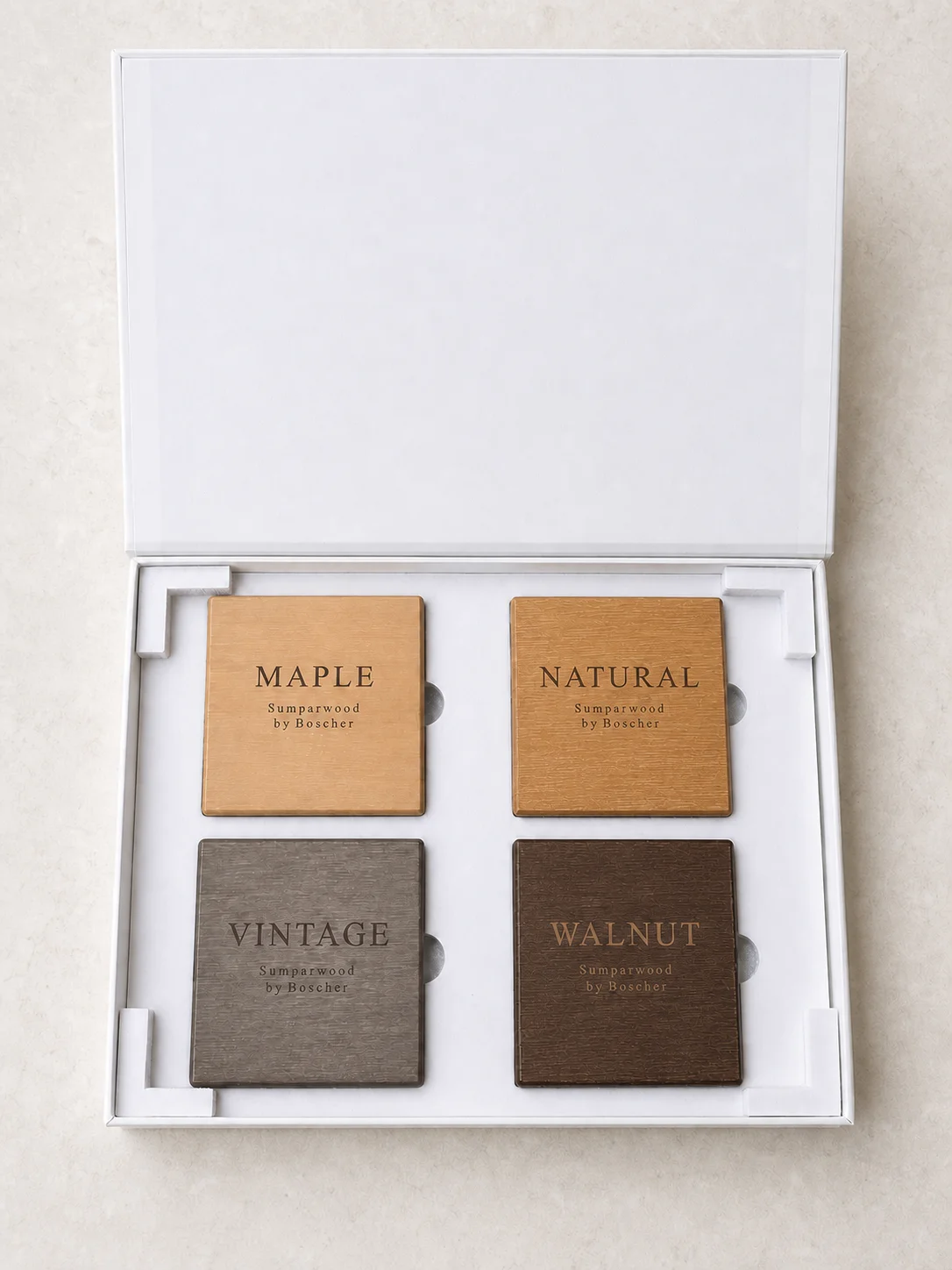 Open box with Maple, Natural, Vintage and Walnut-labelled sample boards